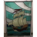 A modern stained glass window of a galleon.