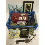A box of assorted items to include rifle cleaning kit, glass chess set and RAC badges.