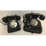 2 vintage black bakelite rotary dial telephones.