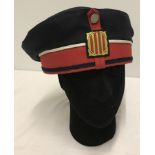 Modern Catalan Army hat with button and insignia detail.