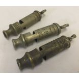 3 vintage Metropolitan whistles.