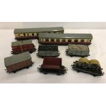 8 unboxed Hornby Dublo Goods Wagons & Passenger coaches.