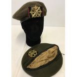 2 Dutch Artillery berets with metal badges.