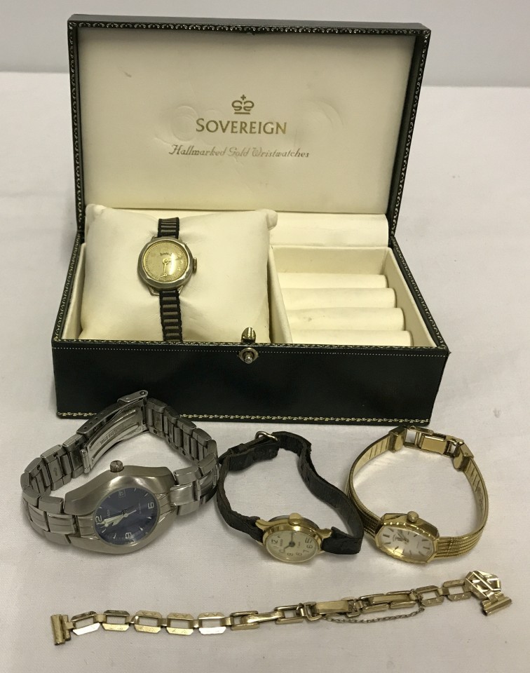 A small green watch/jewellery box with 4 ladies watches and a gold filled Ladyfair watch bracelet.