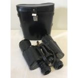 A pair of leather cased binoculars, marked made in USSR.