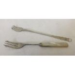 2 silver pickle forks both hallmarked Birmingham.