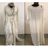 A 1915 Edwardian Silk wedding dress with long sleeves and silk covered button to front.