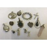 14 silver/white metal pendants/charms.
