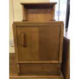 A light oak G Plan bedside cabinet. Single cupboard with top shelf.