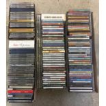 A large quantity of cased music CD's.