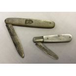 2 silver and mother of pearl handled fruit knives.