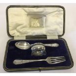 A cased silver plate children's christening set.