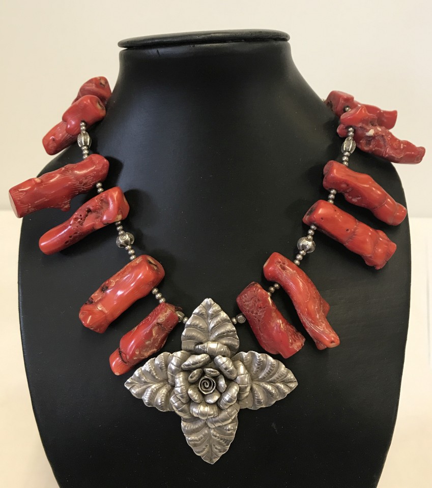 Large coral and white metal necklace.