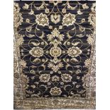 A new Ziegler pattern rug with navy blue background.