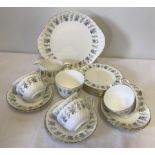 A 6 setting Minton ceramic tea set in "Alpine Spring" pattern.