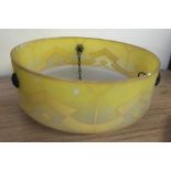 A vintage frosted glass with yellow painted decoration fly catcher lightshade.