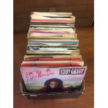 A quantity of vintage vinyl singles.