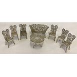 A continental silver miniature filigree table & chair set.