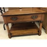 A modern oak coffee table with drawer by Simon Simpson of Norwich.