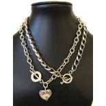 2 heavy large link chain necklaces.