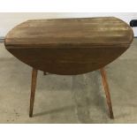 Ercol oval drop leaf table.