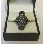 An antique marcasite and sterling silver cocktail ring.