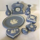 A collection of 8 pieces of blue and white Wedgwood Jasperware ceramics.