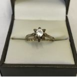 A vintage 9ct gold solitaire ring.