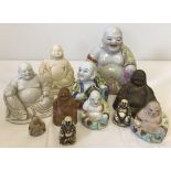 A collection of 11 Buddha figures.