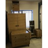 A matching suite of solid wood vintage bedroom furniture. By Russell of Broadway.