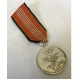 1936 Berlin Olympics medal. 'For meritorious co-operation in the Olympic games 1936'.