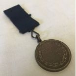 A 1909 All India Hockey Tournament Medal.