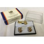 A pair of cufflinks and matching tie bar commemorating the 1988 Seoul Olympic Games.