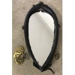 A vintage brass and leather horse harness mirror.