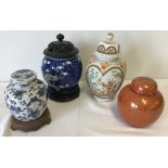 4 oriental ceramic lidded ginger jars.