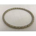 Good quality silver bangle with twisted design.
