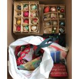 A box of vintage Christmas decorations to include a quantity of glass baubles.