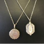 A vintage silver scalloped edge round locket on a silver chain.