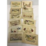A collection of 12 WWI embroidered sweetheart postcards.