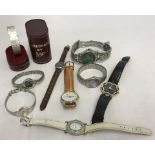 A quantity of gents and ladies quartz and wind up wrist watches.