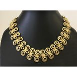 Designer collar style necklace by Erwin Pearl.