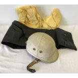 A box of vintage scooter/motorcycle protective clothing.