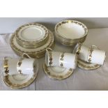 Wedgwood "Whitehall" design coffee set with gilt vine leaf decoration.