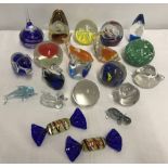 A quantity of glass paperweights, animals and ornaments.