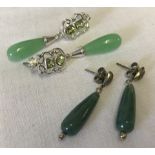 2 pairs of jade drop style earrings.
