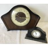 A vintage Smiths wooden cased mantle clock with key.