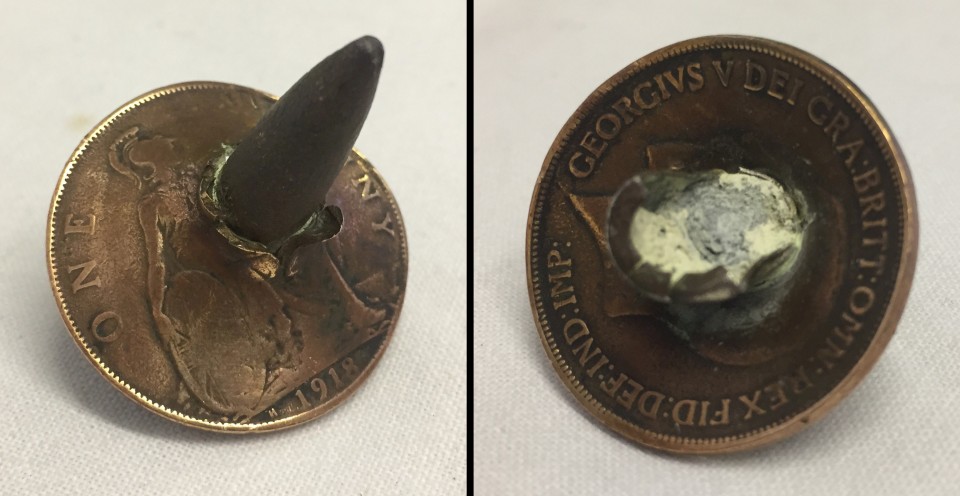 WWI pattern Lucky penny with bullet lodged part way through.