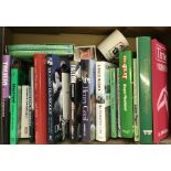 A box of horse racing books and other items to include DVD, mug and keyring