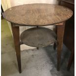 A vintage circular Formica topped cricket table.