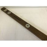 A vintage John Rabone & sons 4ft wooden spirit level No 80.